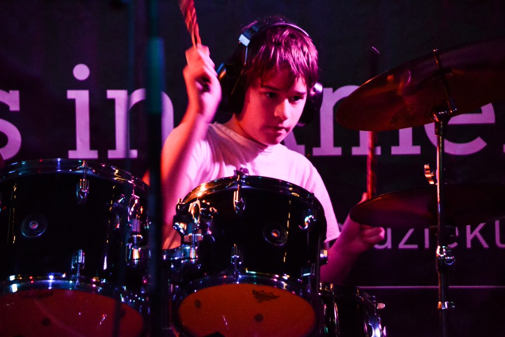 Boy playing drums